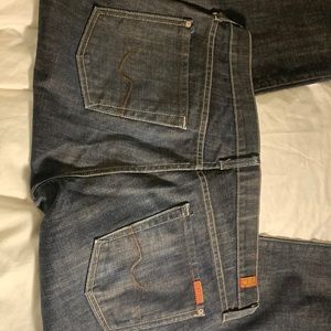 Never worn, button fly, bootcut jeans.